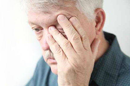 Face com aspecto de cansada